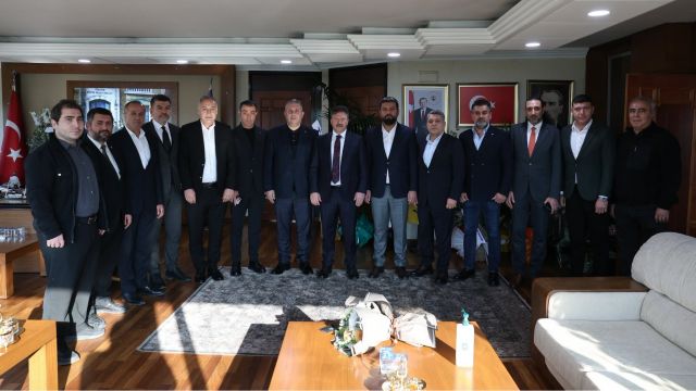 Onursal Başkan Mehmet Yiğiner'e Anlamlı Ziyaret